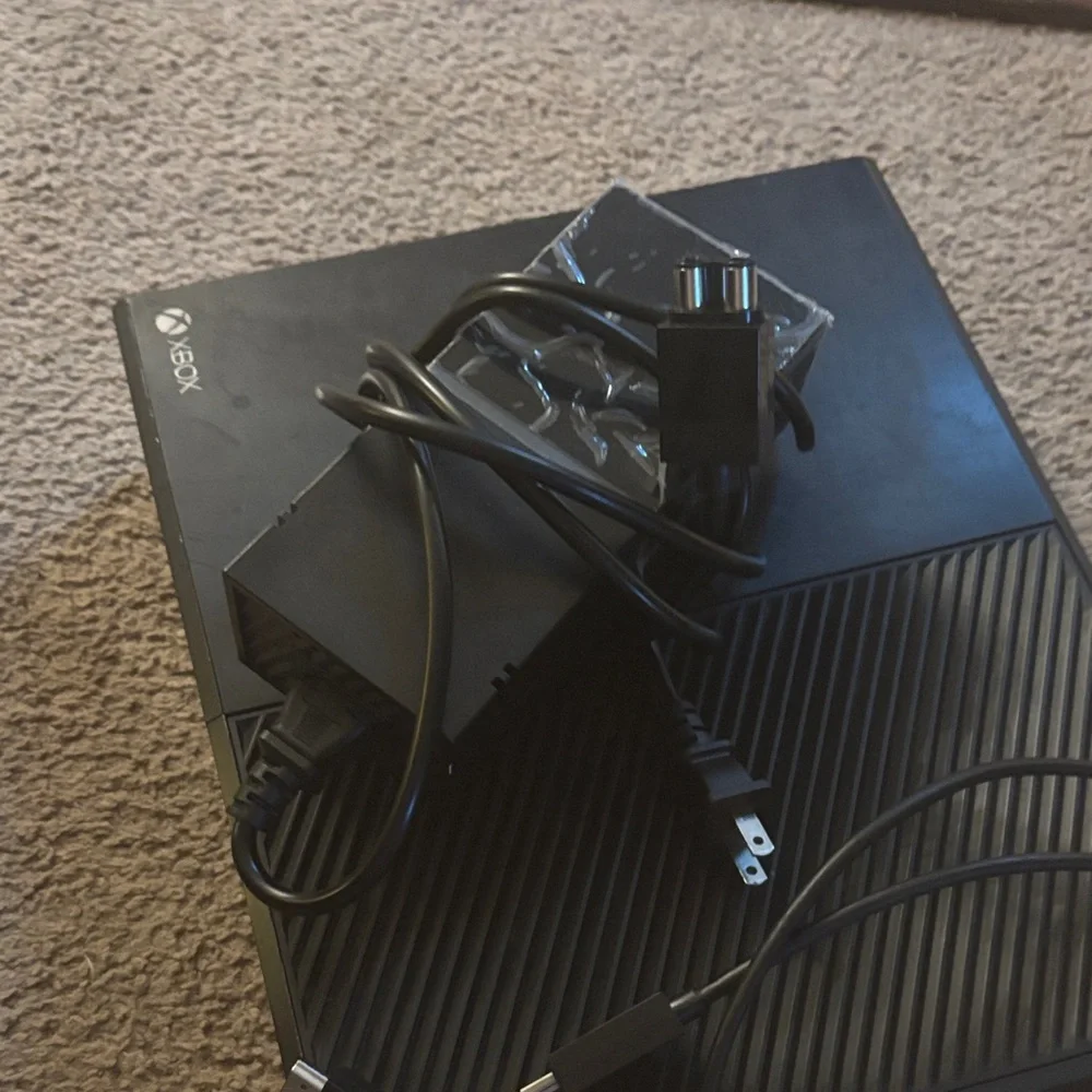 One Black Console Bundle with Black and White Controllers